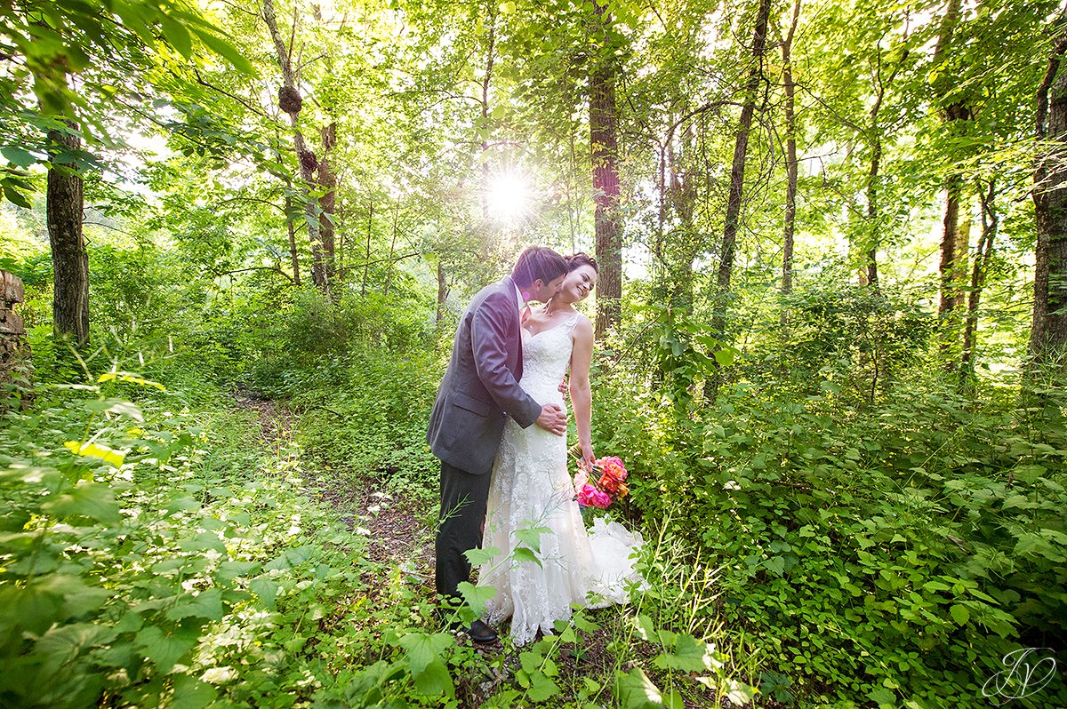 romantic bride and groom in wooded area