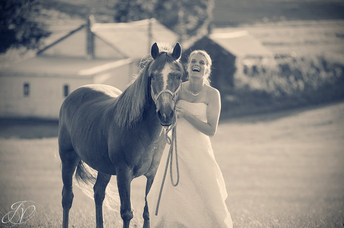 Saratoga Wedding Photographer, upstate wedding photographer, outdoor wedding photo, bride with horse, candid bride photo