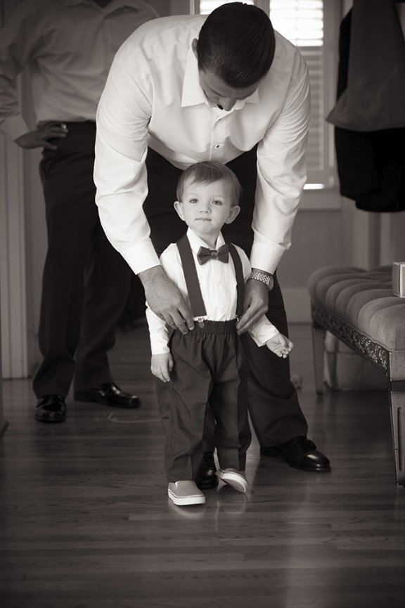 Cute ring bearer getting ready at La Playa Hotel