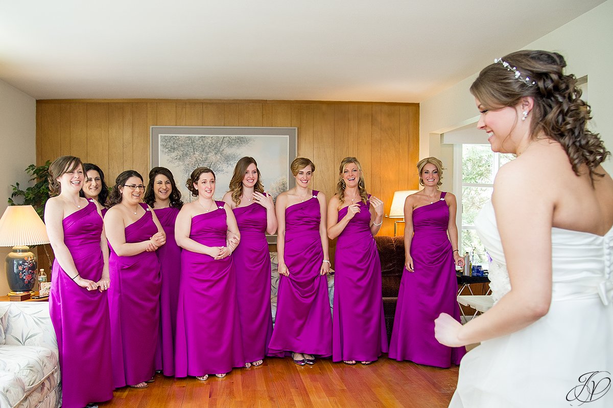 creative first look with bridesmaids