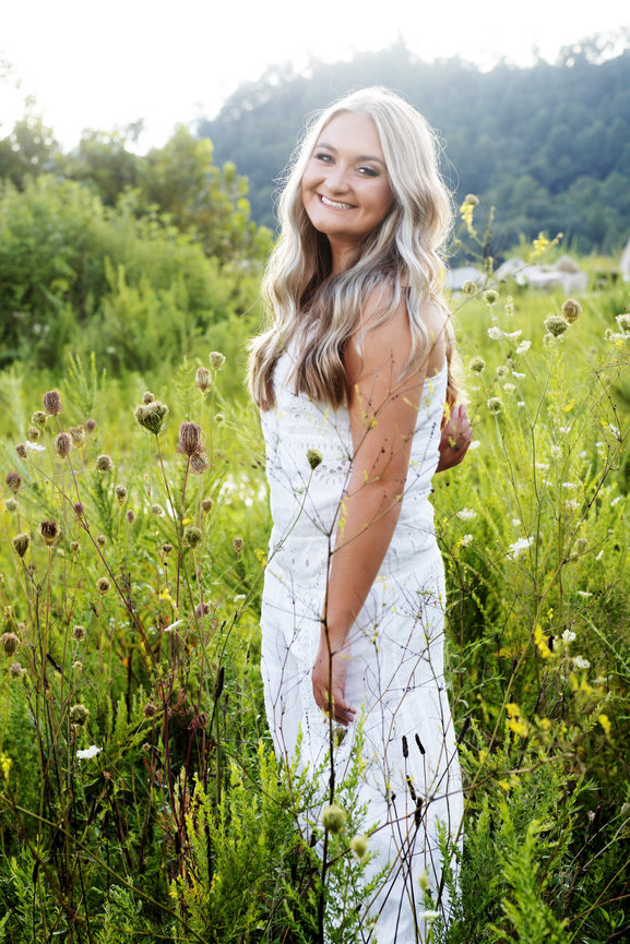 AND THE WINNER OF OUR 2025 SENIOR MAGAZINE COVER CONTEST IS . . .