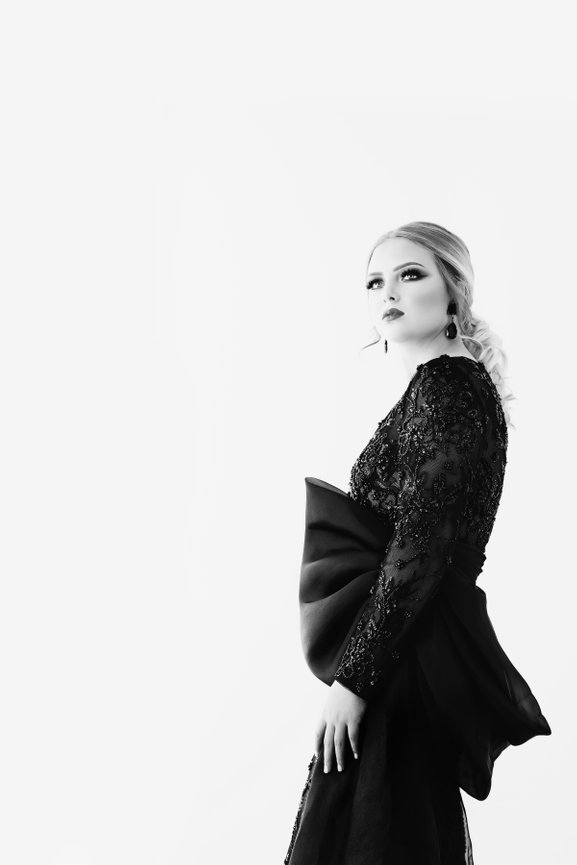 AND THE WINNER OF OUR 2025 SENIOR MAGAZINE COVER CONTEST IS . . .