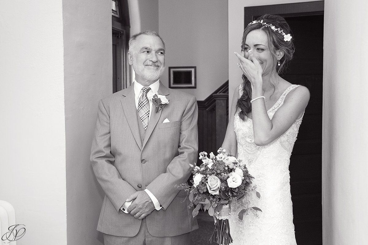 emotional moment with dad and bride at church