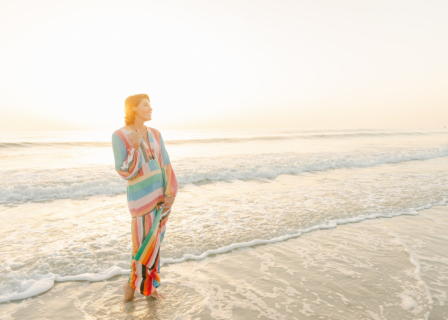 cancer survivor wearing a rainbow dress, Florida coastline, Ryaphotos