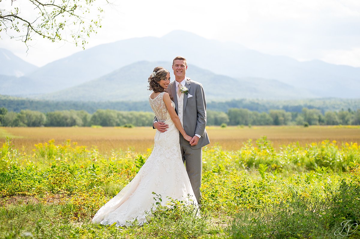 bridal portrait in front of mountain lake placid