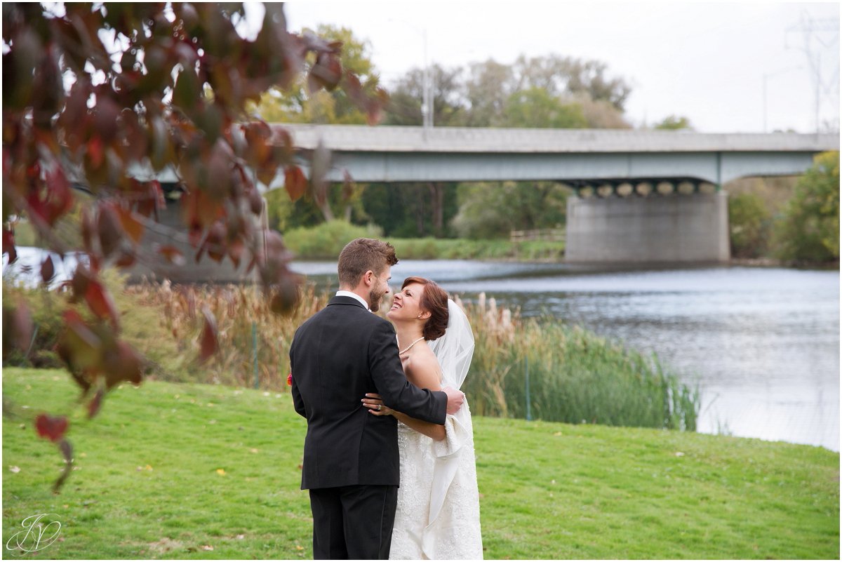 bride and groom laughing waterfront glen sanders mansion wedding