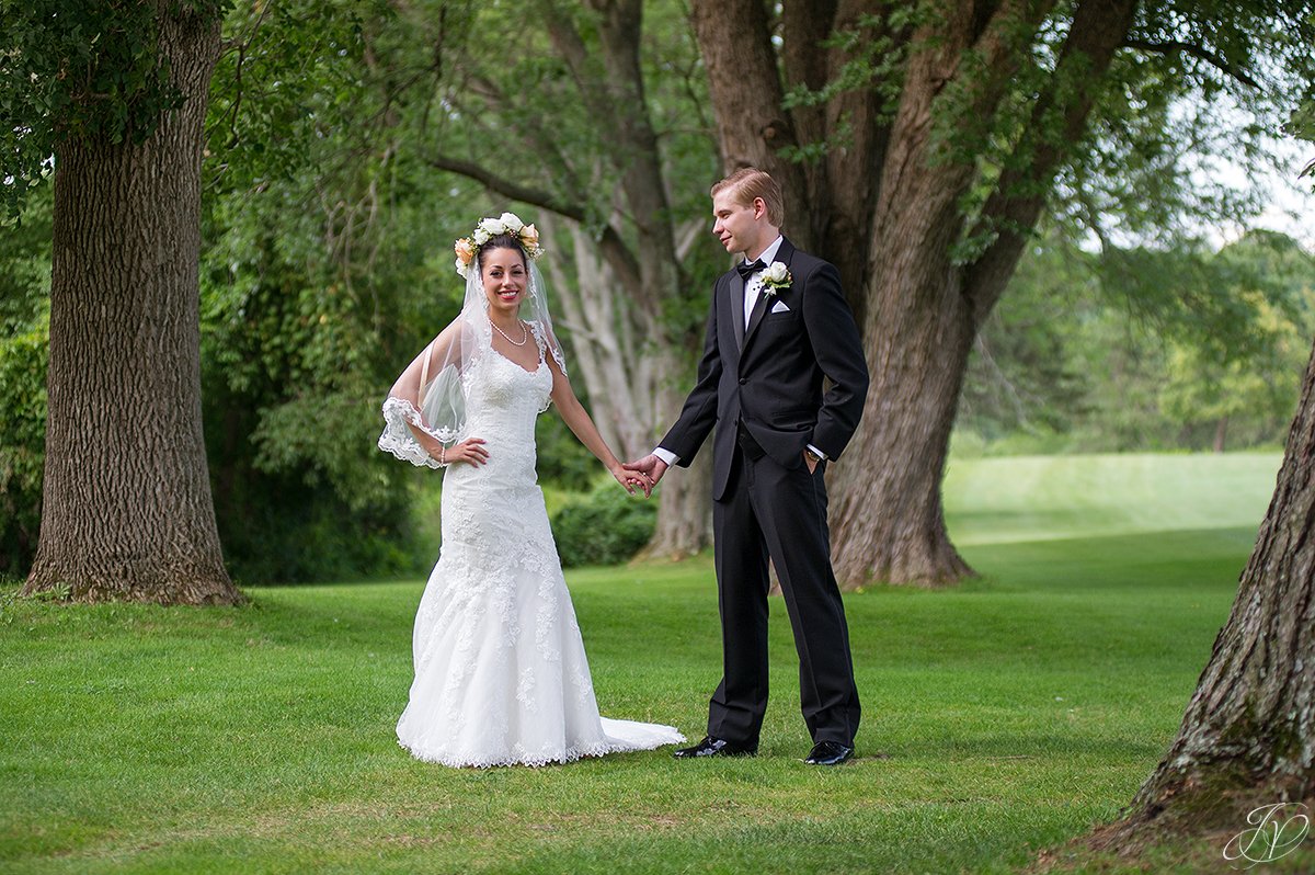 bride and groom outside normanside country club