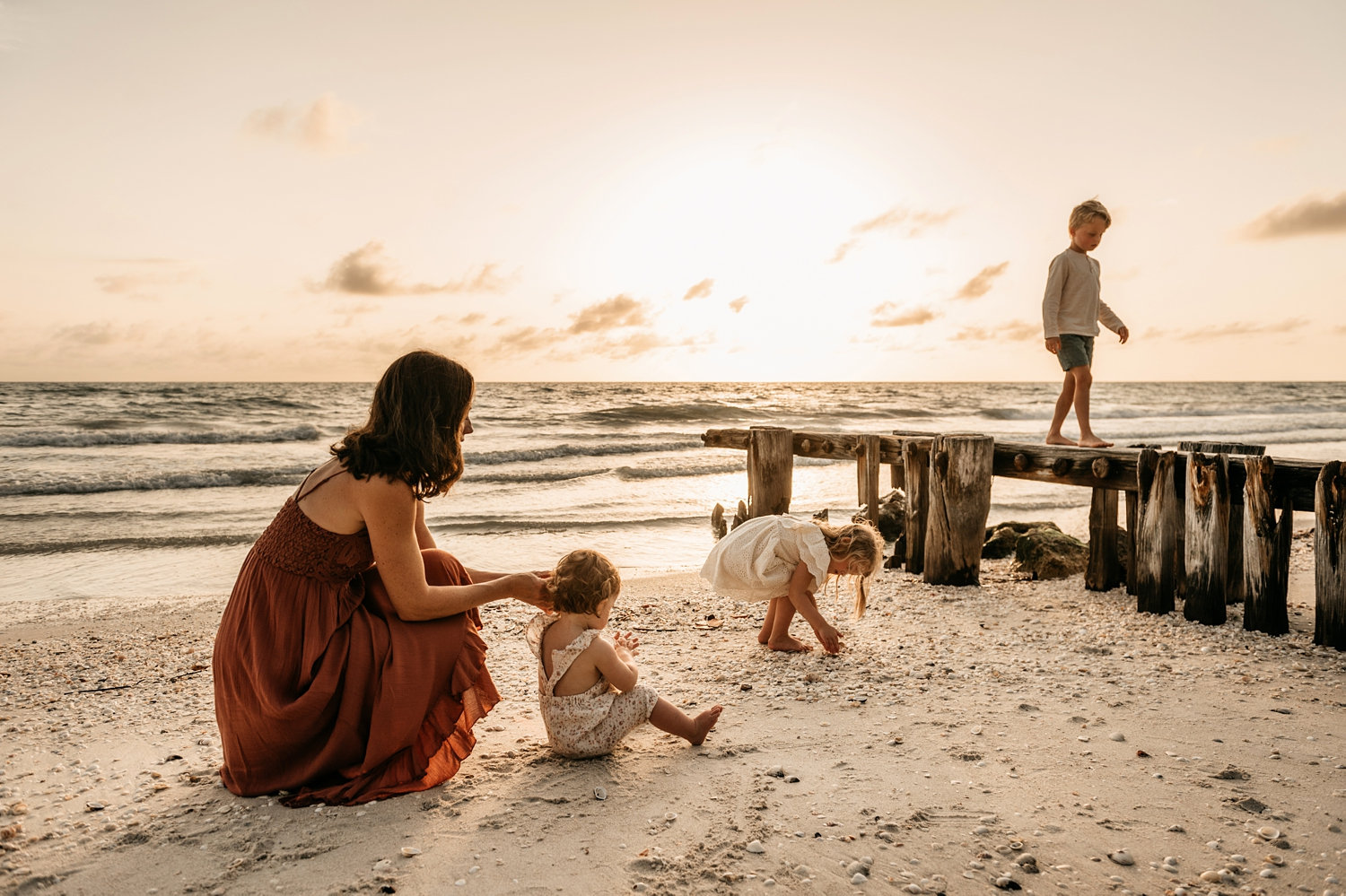 simple family beach portraits, mother and children playing at the beach at sunset, Rya Duncklee Photography