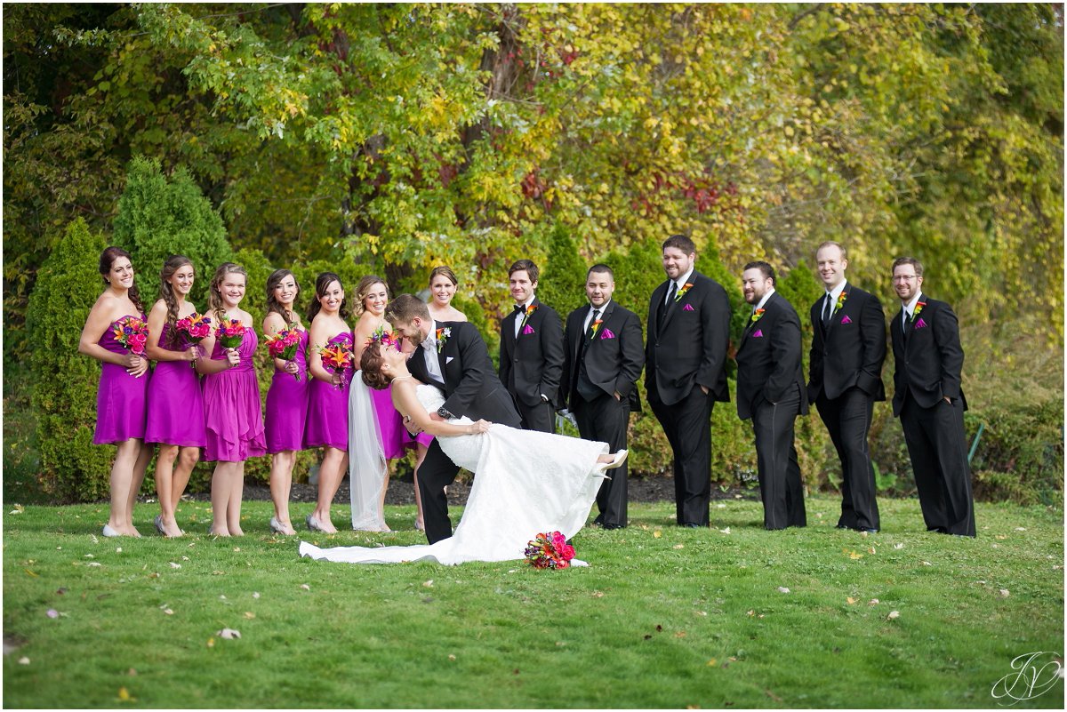 groom dipping bride glen sanders mansion wedding