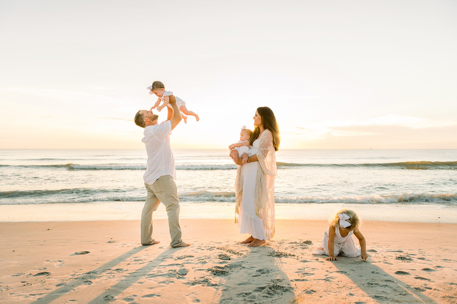 family of 5 on Ponte Vedra Beach at sunrise, Ryaphotos family portrait