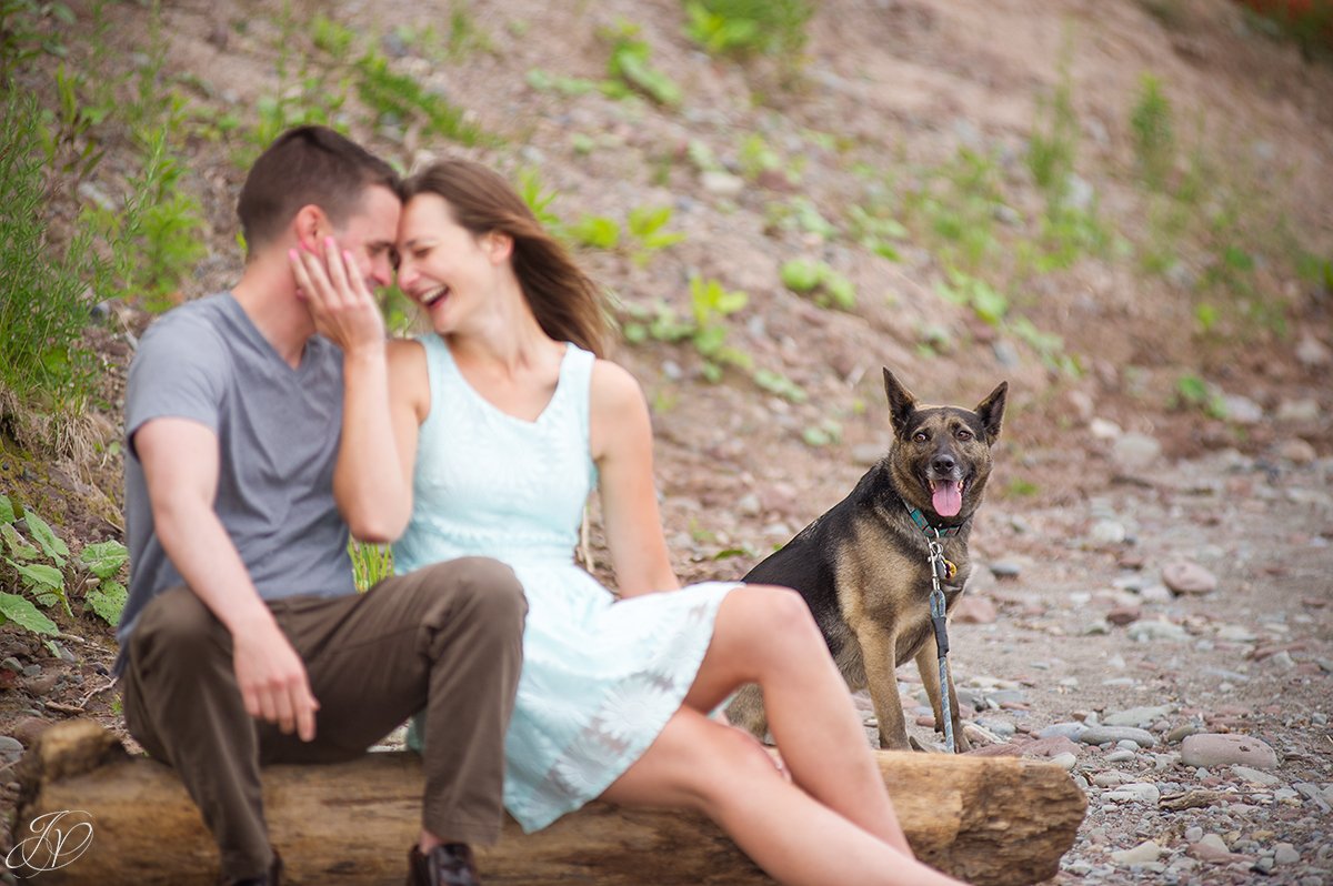 beachfront engagement photo with pet