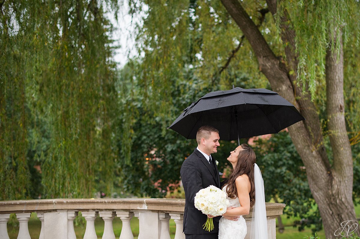 bride and groom rain summer congress park