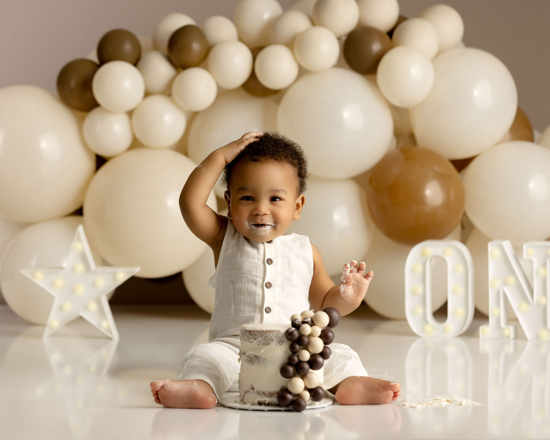 Andrea Ruff Studios - cake smash photography in Orlando showcasing baby’s first birthday