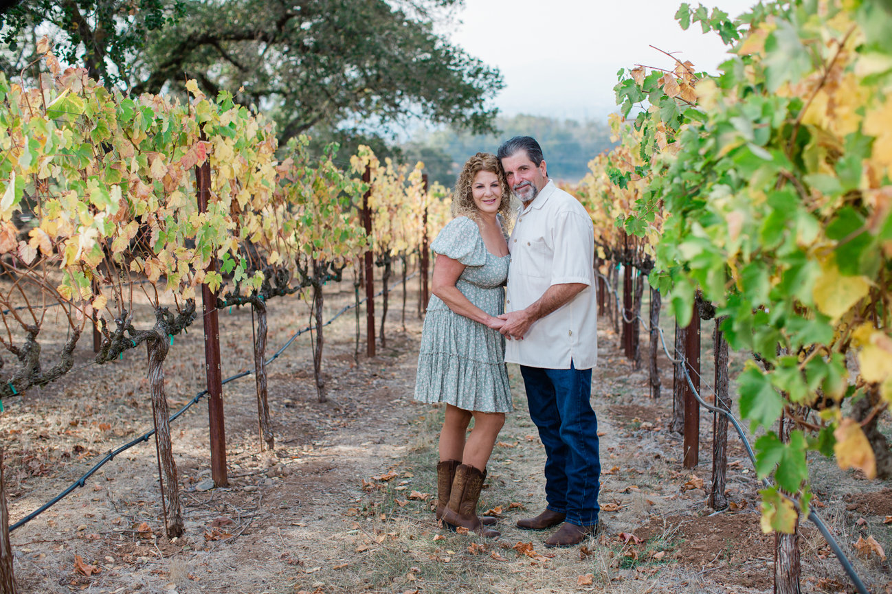 Family portraits during Sunset in a fall vineyard at Paradise Ridge Winery in Santa Rosa,  Sonoma County Ca, taken by Sheila Johnson of Studio J Photography