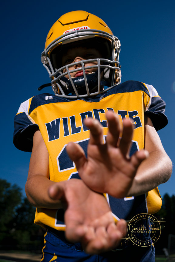 football player standing on a football field