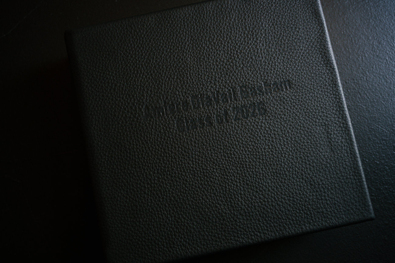 leather keepsake box with senior guy photo album inside