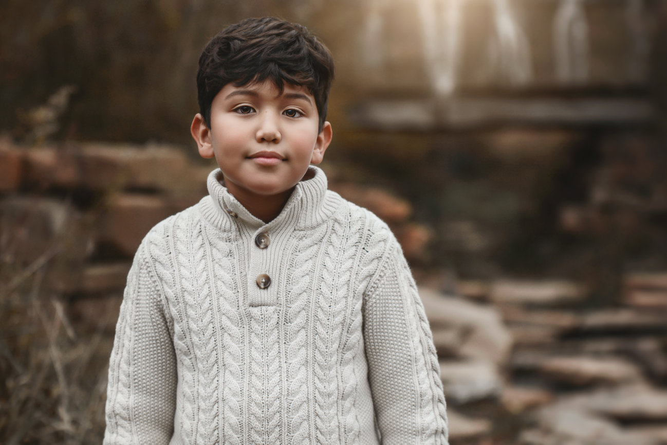 Fall family portraits at a beautiful park at sunset