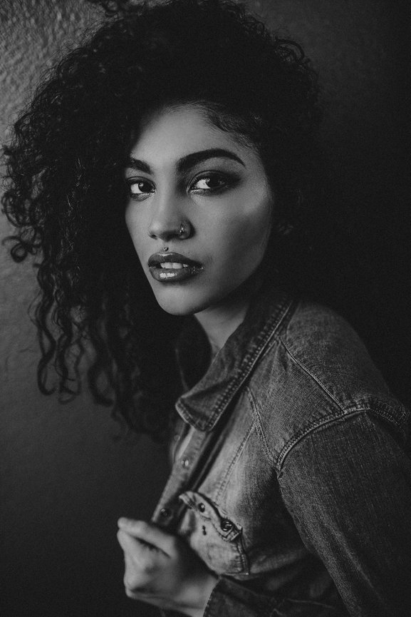 Elegant black and white studio portrait created by Adam Trujillo.
