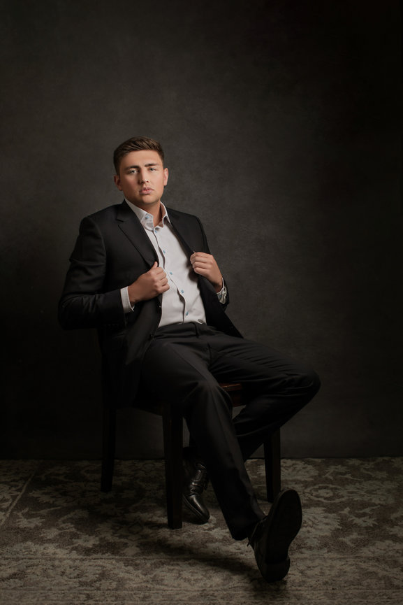 Professional male photography portraits in studio with confidence and poise, taken in a photo studio with Adam Trujillo, a Las Vegas portrait photographer.