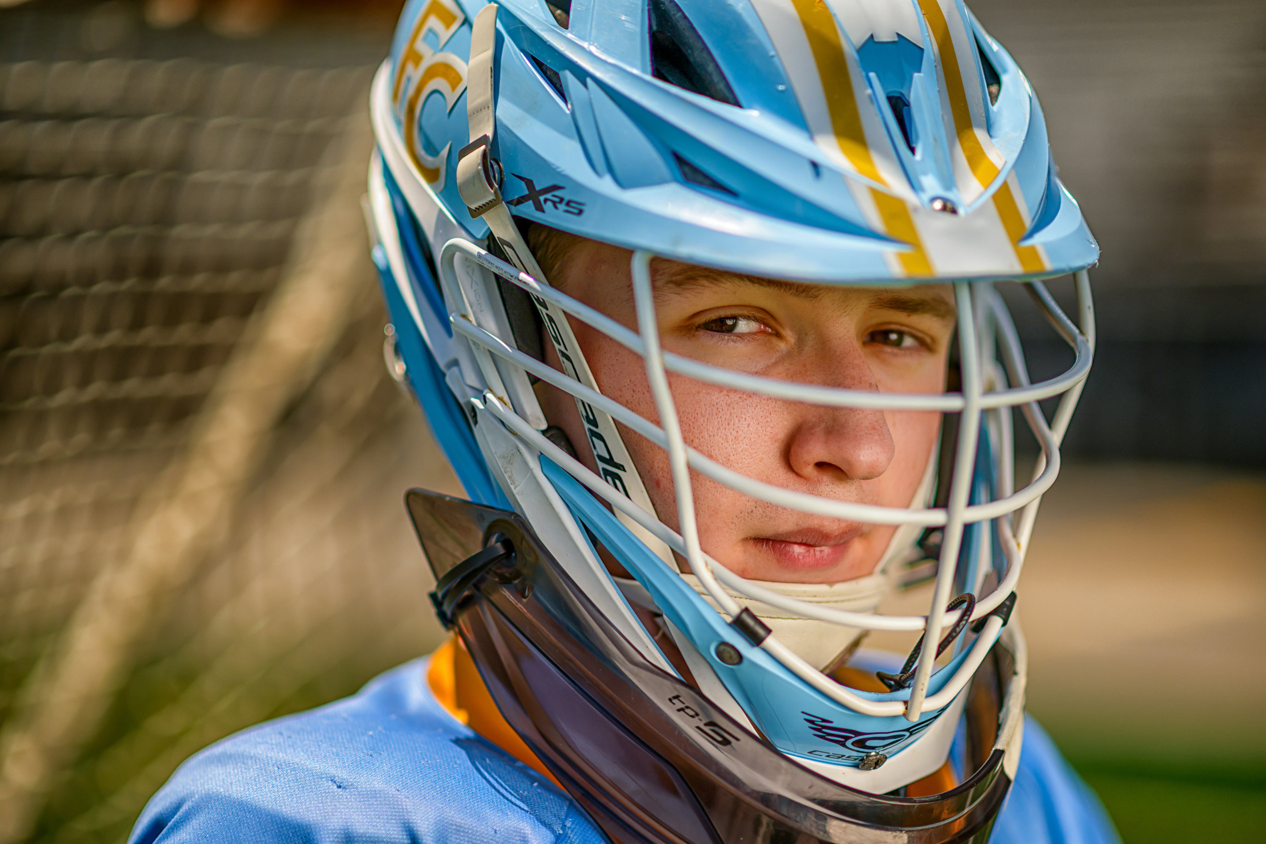 First Colonial High School Class of 2025 Valedictorian Joseph S. wearing his LaCrosse helmet.