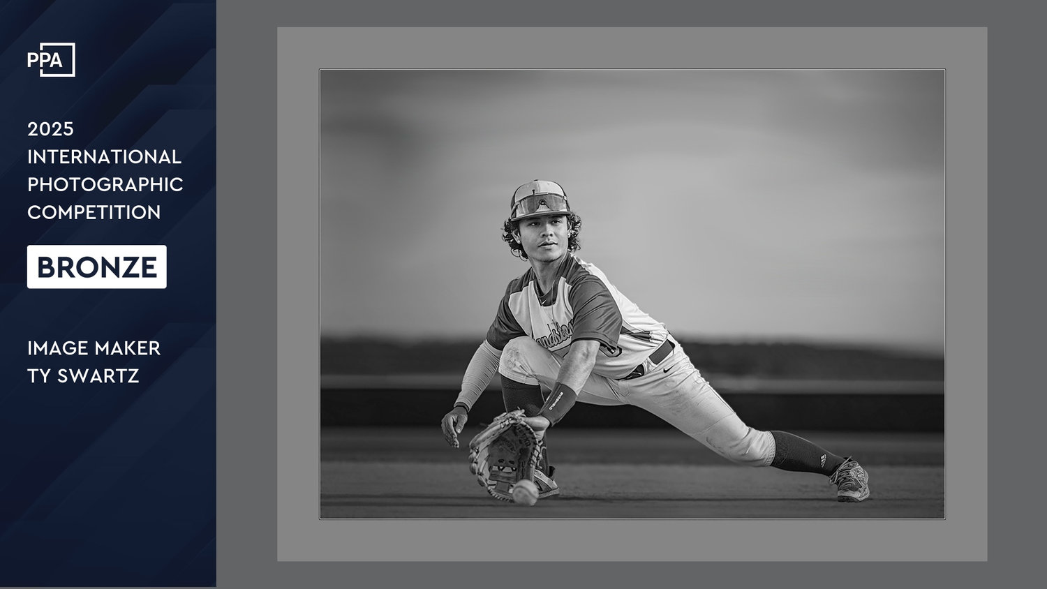 Stretch, award-winning senior portrait by Ty Swartz of a high school senior second baseman catching a baseball, 2025 PPA Bronze Medal