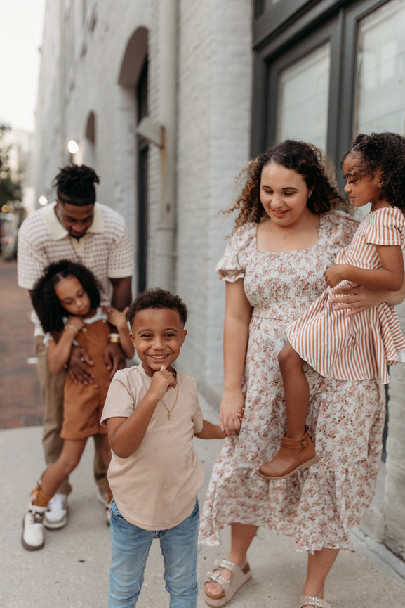 Huntsville Alabama photoshoot Black family walking down city street