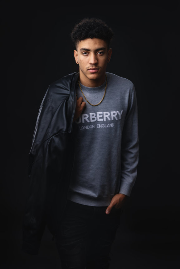 High School Senior Guy Burberry sweater studio portrait