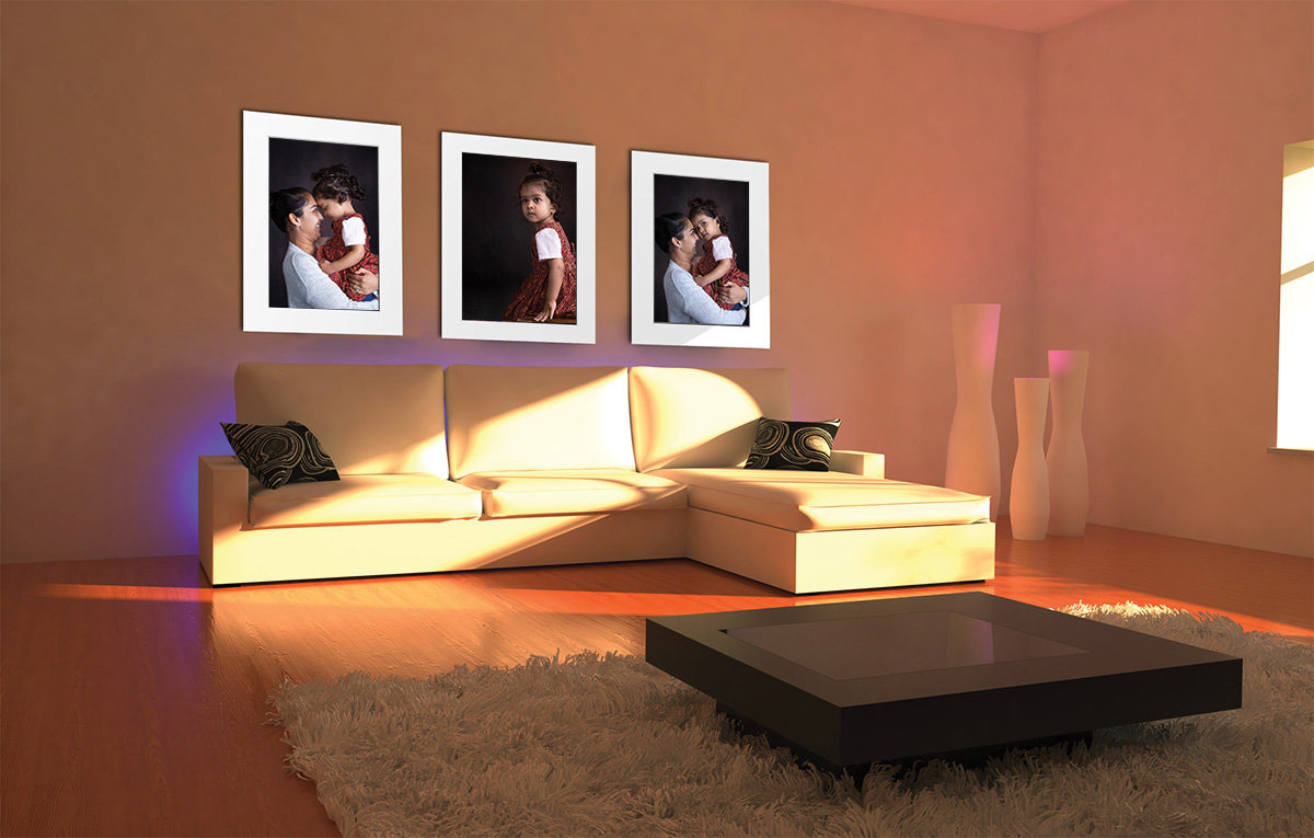 Family portrait wall art collection with large megamat prints displayed as a refined statement for the home