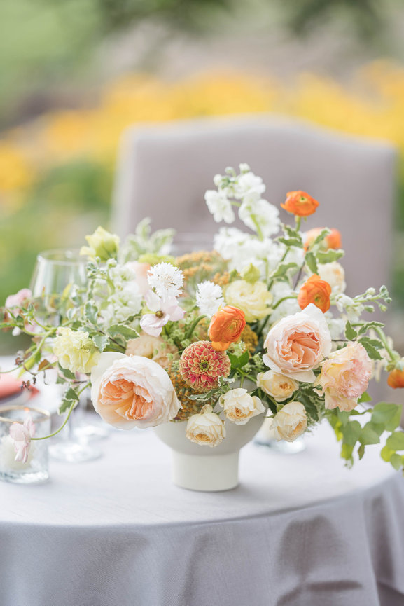 Fesh table scape capturing ealy dpring moments with a delicate citrus feel