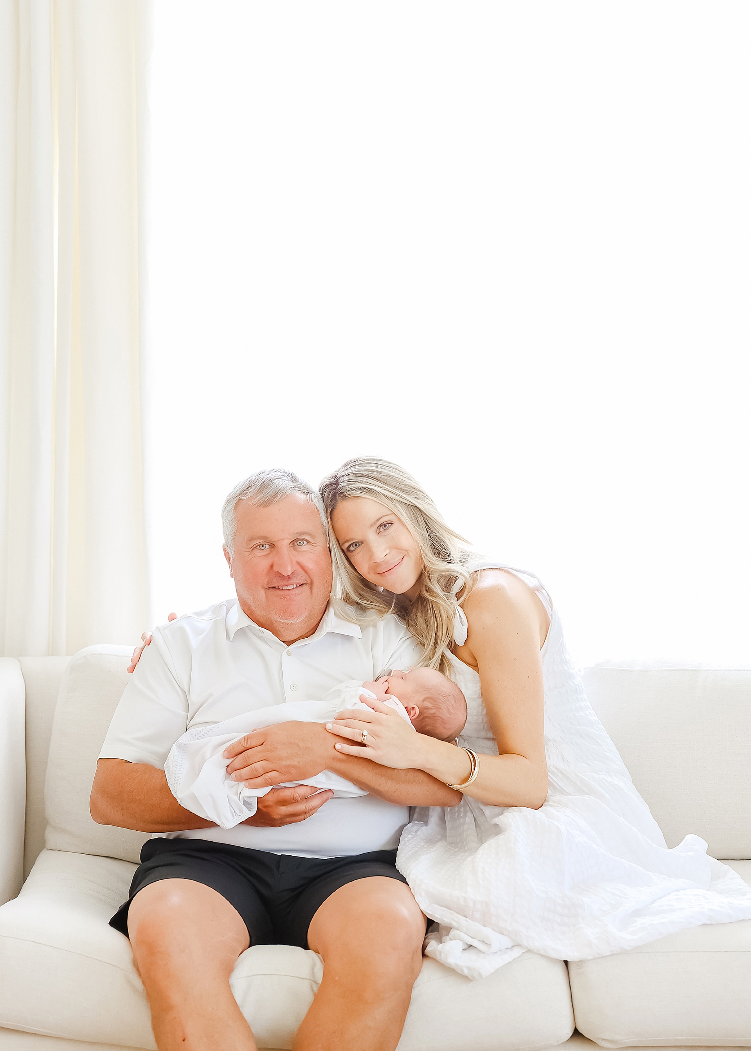 In home newborn portrait session with grandparents.