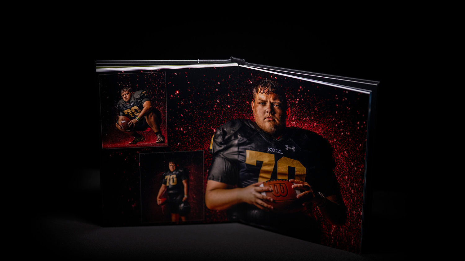 A photo album open to pages featuring an American football player in a black jersey, holding a football against a red backdrop.