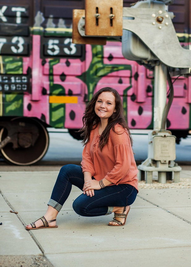 HS Senior Girl in front of fun graffiti train
