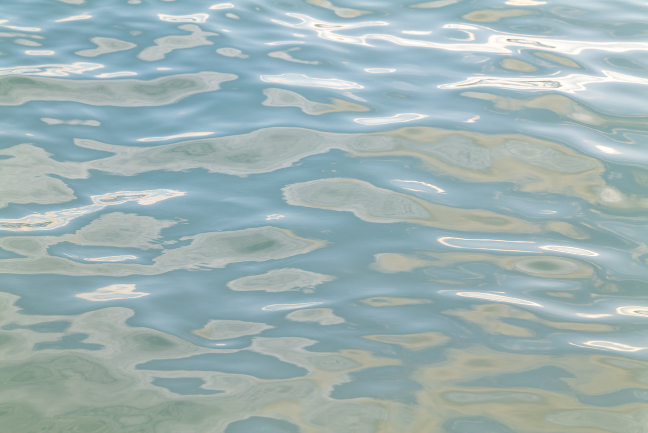 Liquid Light III - abstract ocean fine art photography by Andrea Bruns featuring luminous water reflections and painterly coastal light.