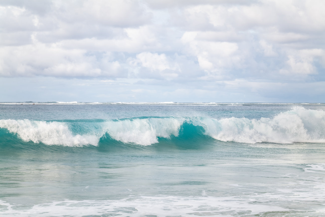 Ocean Crest - coastal fine art photograph by Andrea Bruns featuring a powerful turquoise ocean wave breaking along the Pacific coast.
