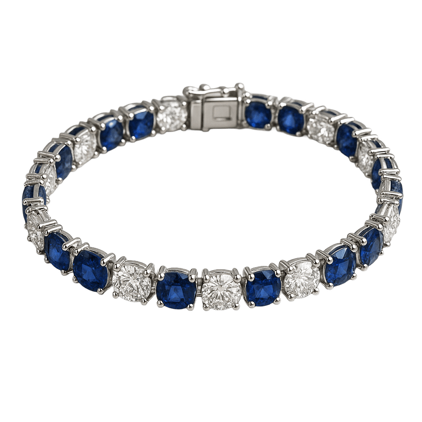 Elegant tennis bracelet featuring alternating round-cut blue sapphires and white diamonds set in platinum, displayed on a white background
