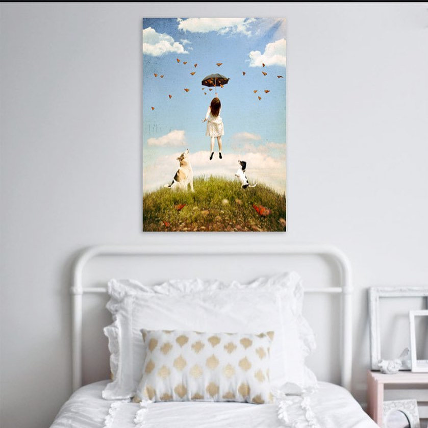 portrait of child with dogs hanging in bedroom