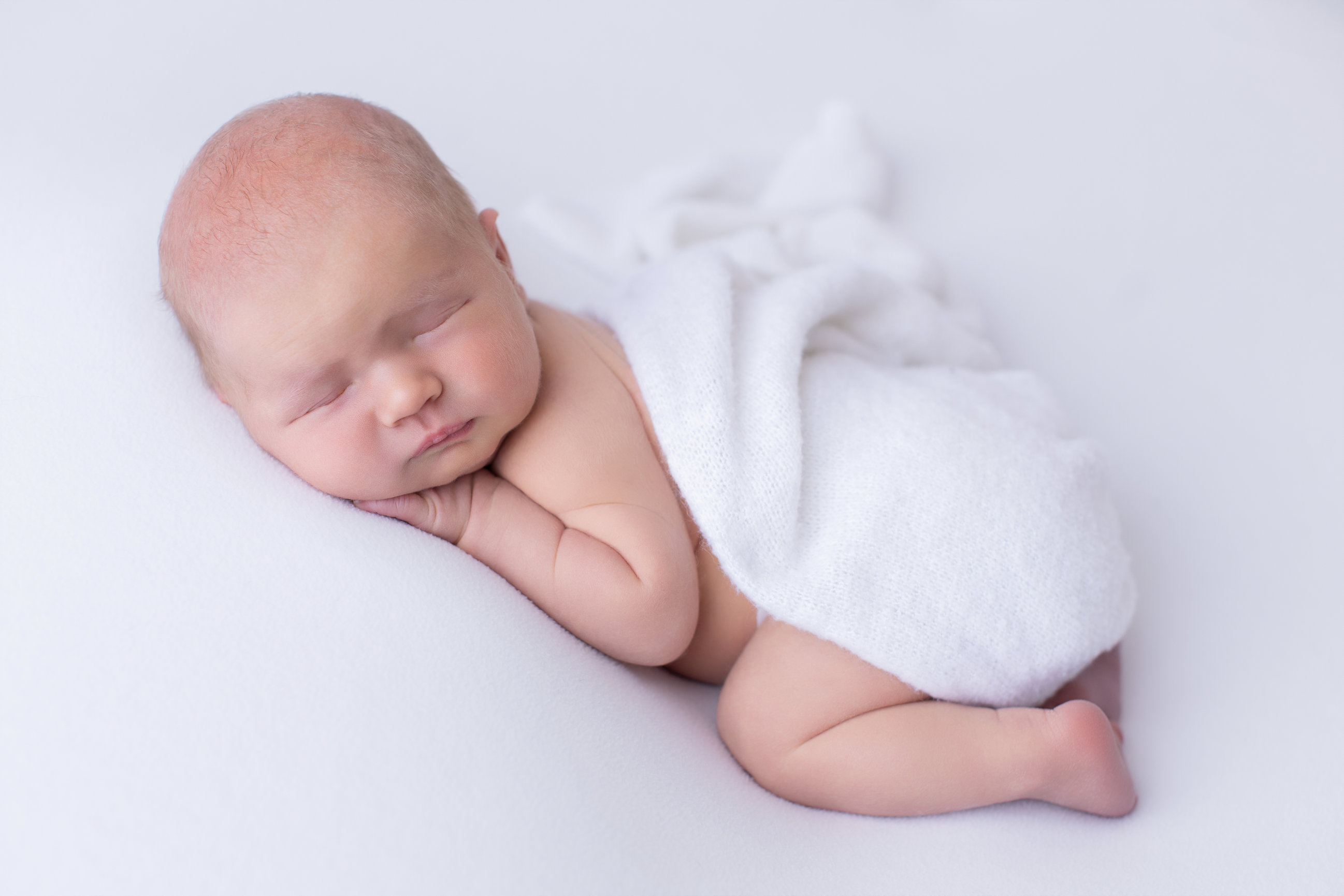 Calgary newborn photography white mauve and big brother love Newborn III session photo 3
