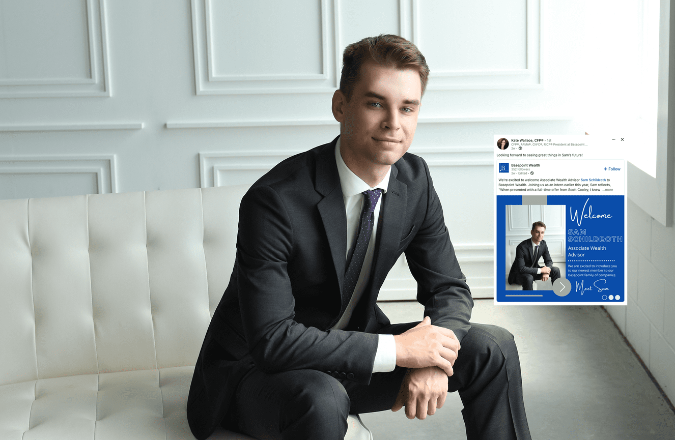 A confident young man in a gray suit poses at Kliks Photography for his company announcement photo.