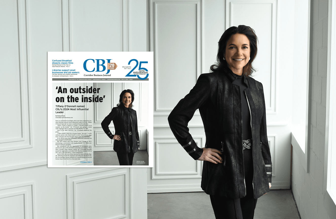 Mayor of Cedar Rapids, Iowa, Tiffany O'Donnell strikes a professional pose at Kliks for a cover photo of the CBJ Journal.